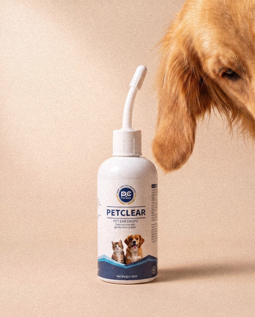 Merdello Ear Cleaning Drops for dogs and cats — bottle with a soft curved tip, next to a golden retriever